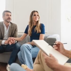 Focused Young Couple in Therapy: Emotions and Insights Captured